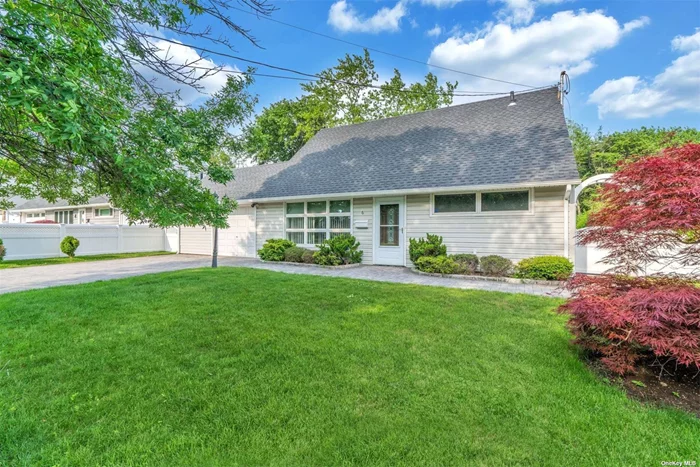 Totally renovated home featuring Large living room, formal dining, at in kitchen with energy star appliances. Expanded Primary bedroom on the main floor. Laundry, hardwood floors, underground sprinklers, Fenced in large backyard. 1.5 car attached garage. Commuters dream, Updated kitchen and baths. fenced in backyard. Berry Hill Elementary close distance to LIRR, restaurants, and shopping. Syosset SD#2