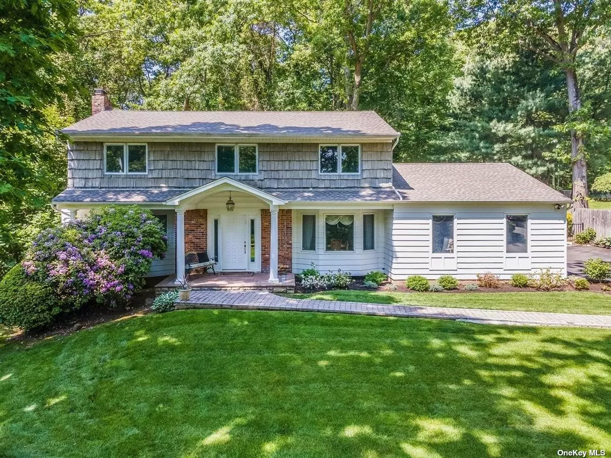 Welcome to this stunning colonial home located Village Hill section of Dix Hills, Long Island. Situated in the Half Hollow Hills School District, this property offers an exceptional living comfort, privacy, and convenience. Upon entering this remarkable residence, you are greeted by a spacious entry foyer, setting the tone for the elegant and welcoming atmosphere found throughout the home. The recently renovated kitchen, conveniently located adjacent to the Den, boasts modern amenities and provides a seamless space for culinary creations and entertaining guests. The Den itself is bathed in natural light, creating a cozy and inviting ambiance for relaxation. For those seeking the ultimate entertainment experience, this home features an incredible sound and theatre room. Whether you are a movie enthusiast or simply enjoy media and music, this space offers a sanctuary for indulging in entertainment. Sit back, relax, and immerse yourself in the audiovisual wonders of this dedicated room. The second floor of this colonial gem offers a spacious master bedroom complete with an oversized walk-in closet and a luxurious master bathroom, providing a tranquil retreat for homeowners. Additionally, there are three other generously sized bedrooms and a full bathroom. The finished basement presents versatile options, with an office space ideal for remote work or study, as well as a media/workout area. Whether you need a private sanctuary for productivity or a dedicated space for exercise and recreation, this home has you covered. One of the standout features of this property is its location backing up to land that can&rsquo;t be developed. This unique advantage not only ensures an abundance of privacy but also offers picturesque views of nature. Step into your backyard oasis, complete with a lovely deck for relaxation and outdoor dining, and ample open grass. Convenience is key, and this home excels in providing easy access to shopping centers, catering to your everyday needs. With a plethora of entertainment options nearby, you can enjoy a wide array of activities and experiences without sacrificing time or distance. Don&rsquo;t miss this opportunity to make this exceptional colonial your own, combining comfort, privacy. Schedule a viewing today and embrace the lifestyle you&rsquo;ve been dreaming of.