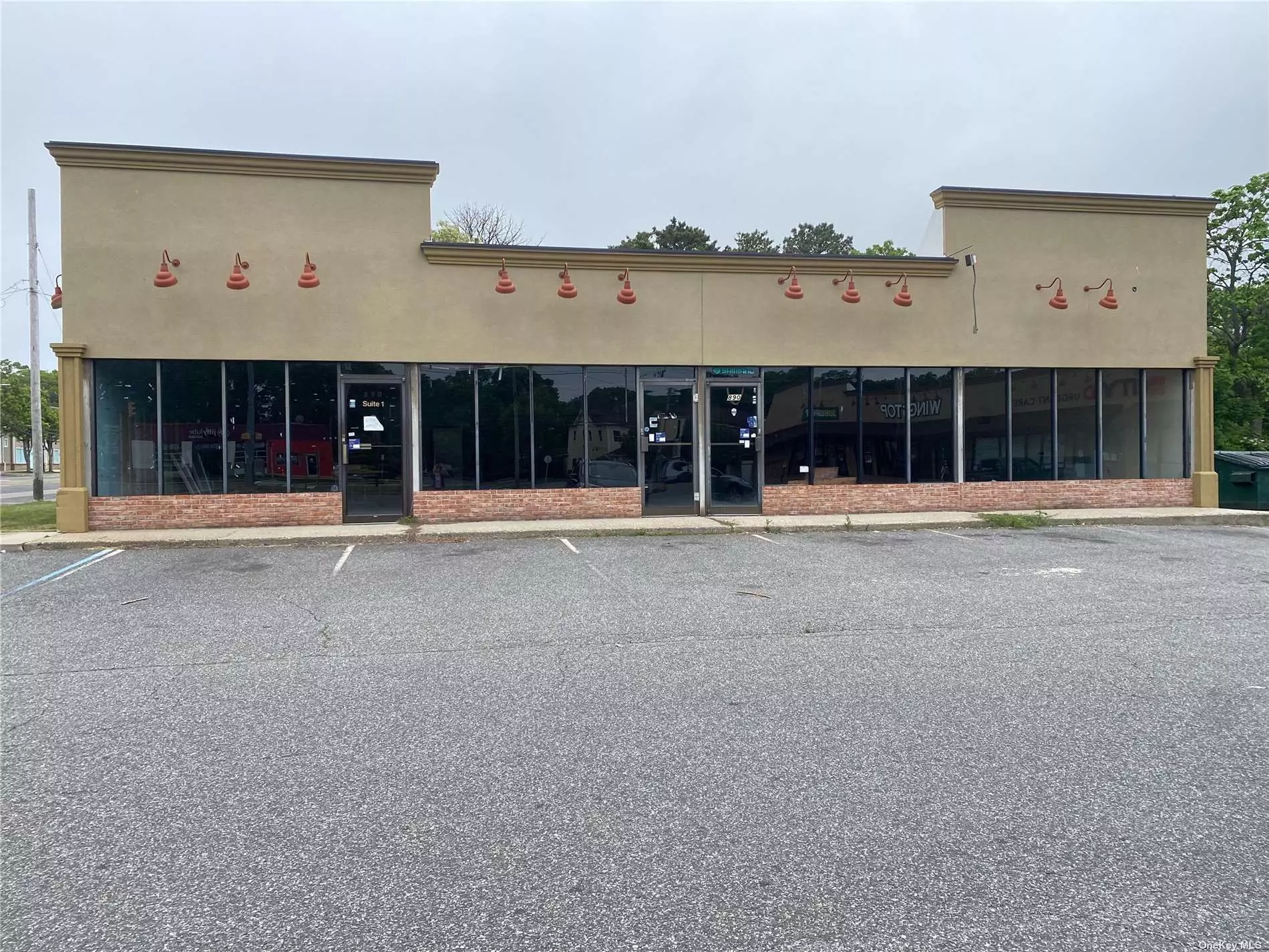 Free Standing Building approx. 3000 Sq Ft @$40.00 sq.ft. corner property w/ entrances off of Montauk Highway and Grand Ave. High Traffic area shared parking lot with City MD, Wing Stop & Subway. Triple Net Lease Two Traffic Lights