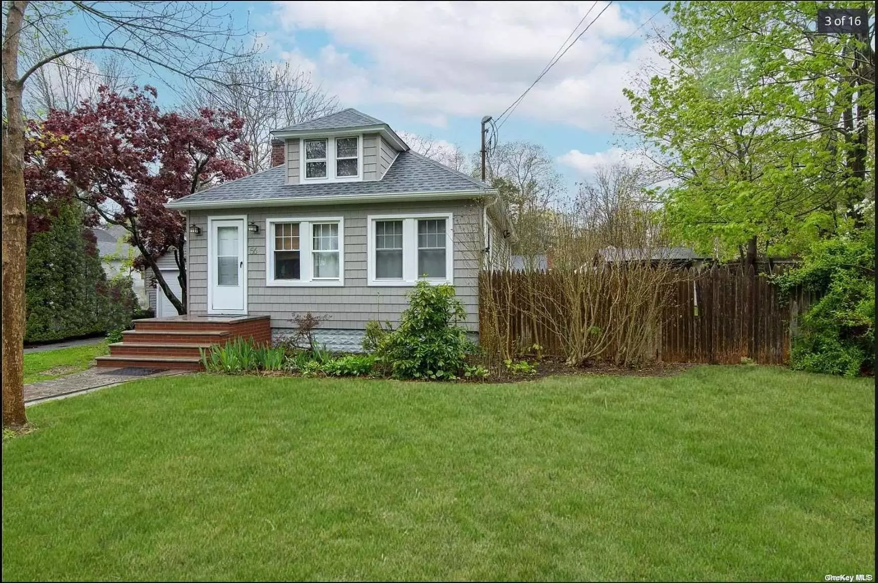 Fabulous Year Round or Summer Getaway! Light & Bright Updated Ranch! EIK w/Maple Cabinets, Stainless Steel Appliances including Gas Stove, Hardwood Floors Throughout, Custom Paint & Moldings, Hi Hats, Ceiling Fans, French Doors, Updated Bath, Gas Heat, Full Basement with Outside Entrance, Newer Roof, Windows, & Siding, Beautiful Level Fenced Yard with Deck, Detached 1 Car Garage, and Long Driveway for Plenty of Parking! Close to North Shore Beaches, Wineries, Outlets, & More! This Home was Formally a 2 Bedroom, Converted to One Large Bedroom! A Must See! Won&rsquo;t Last!