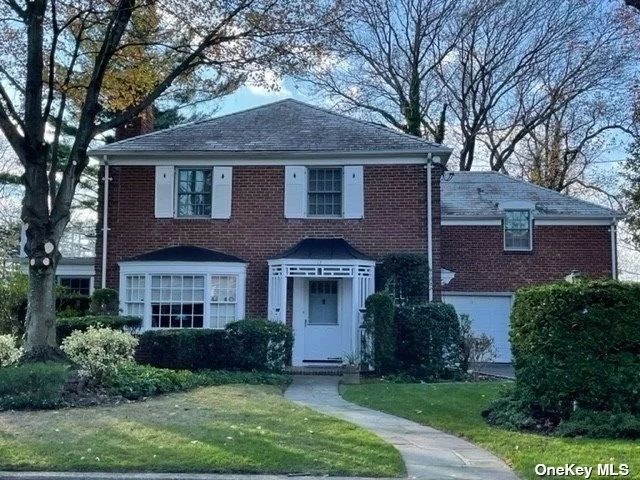 All brick construction center hall Colonial. First Owner was an architect that designed and built the house;Mill work and woodwork highest quality throughout the residence, oak wood banisters and doors and floors, gas heat 2 zones, CAC 1 zone, heated 2 car garage, all slate roof, gas hot water heater, sewer and beautiful specimen and mature plantings front and back.