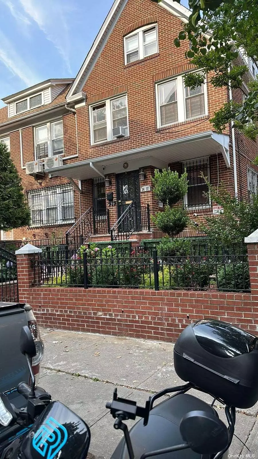 Huge One Dwelling Semi-Detached 4 Br, 3.5 Bath, Large Attic With Full Bath,  1 Garage, Private Driveway/ Large Patio, Laundry Room, The House Is Fully Fenced and Minutes To Station 7 Train Station At 90th St & Roosevelt Ave. Fully Renovated Finished Basement with Separated Entrance.