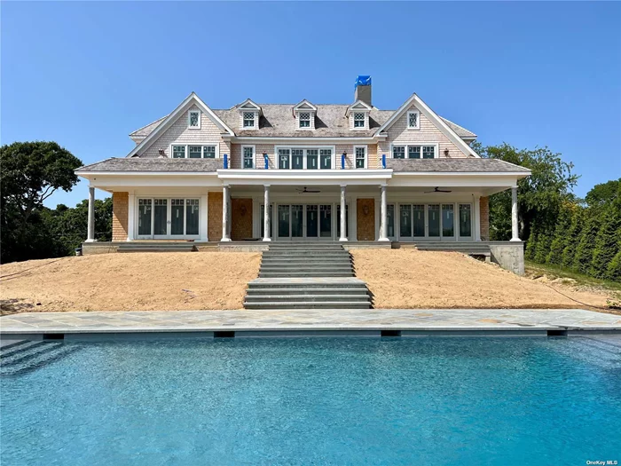 Spectacular new estate to be created on this oversized 1.48 acre property in Shinnecock Hills. Plans to build this luxurious Hamptons estate include 8, 500 sq ft home, 20x40 heated gunite pool and spacious pool house. The two story residence includes open living areas with 10 foot ceilings, grand 2 story foyer leading to the living room with sliders to the patio and pool, a chefs eat in kitchen with additional seating at island, great room, dining room and Jr Primary Suite with walk in closet on the first level. Second level hosts a Primary Suite with walk in closet, 4 additional bedrooms with en-suite baths, and a laundry room. Lower level features a gym with sauna, refreshment area, family room, additional bedroom and full bath. Still time to customize! Minutes to ocean beaches, world renowned golf courses, wineries and so much more!