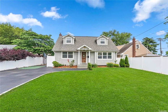 Beautiful Expanded Cape Cod With Updated Granite/Stainless Kitchen, Large Laundry Room Off Upstairs Bath, Master With Huge Walk In Closet, Storage Galore, Trex Deck Off Dining Area, Hardwood Floors...Move Right In!!