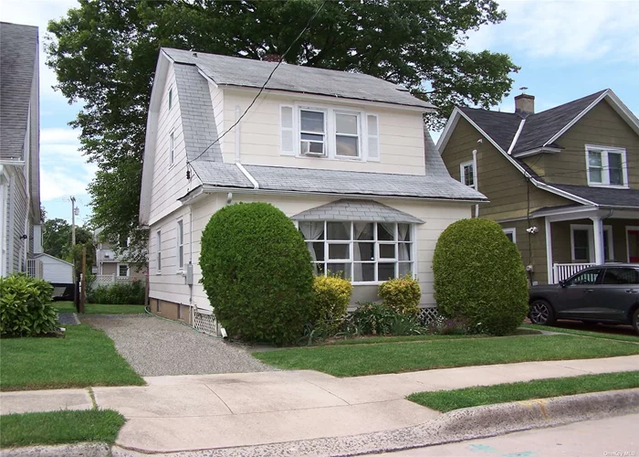 Port Washington 3Bedroom Colonial. Welcoming Front Porch - Living Room, Dining Room, Kitchen - Large Attic with Possible Potential for an additional room. Quiet & Charming Area - Oil Heat, Gas in the Street - Unfinished Basement. Port Washington Schools.