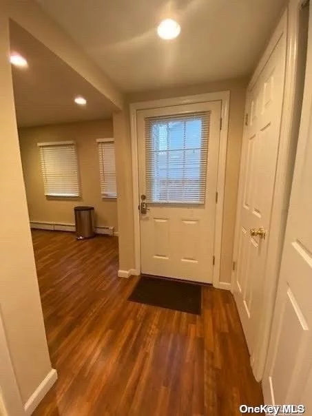 Gorgeous 1 bedroom apartment with hardwood floors, updated kitchen and bath, lots of windows, washer dryer, fenced in patio area, off street parking . Landlord provides heat and water, tenant to pay electric (separate meter) and cable. No smoking no pets.