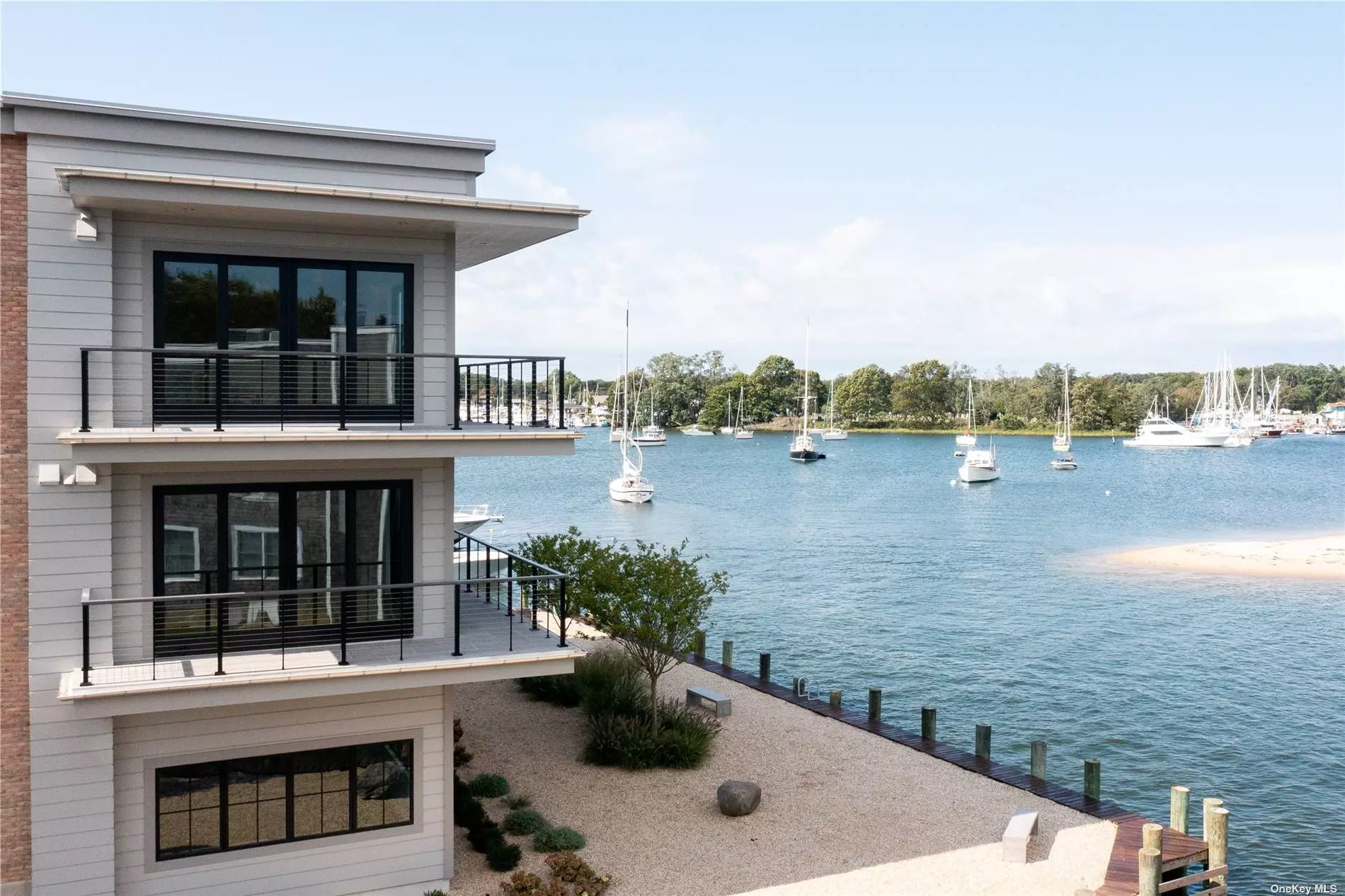 Perched above the water with expansive views of Greenport Harbor and Stirling Basin, 123 Stirling offers modern luxury on one of Greenport Village&rsquo;s most beautiful residential streets. Each unit includes a private boat slip, dedicated indoor and outdoor parking spaces, in-unit laundry and ground floor maritime space with a half bath. Four blocks from the center of the village&rsquo;s shops, restaurants, and galleries. Great proximity to Jitney and LIRR for easy access to NYC. Unit 4 features two bedrooms, two full baths, and one half-bath. Open-concept kitchen/dining/living room. 459 sq ft maritime space with an additional half bath. Sale is subject to the terms & conditions of an offering plan.