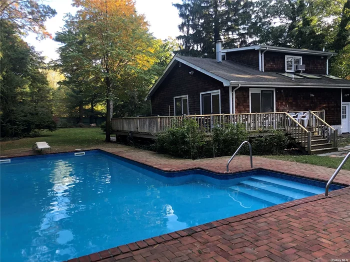 Charming & Renovated Country Colonial With Beautiful Private Property, Inground Pool W/Brick Surround, Spacious Decking, Vaulted Ceilings, Skylights, Recessed Lighting, Open Floor Plan. Near Village & Park.