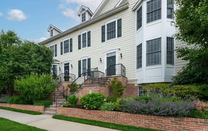 Abundant natural light floods this beautifully maintained, 3-floor townhouse situated in the heart of historic Oyster Bay. The open plan on the main floor offers high ceilings, stainless steel appliances, granite countertops, a kitchen island, a gas fireplace, a west-facing balcony and multiple dining/seating options. Upstairs, the master suite features coffered ceilings, 2 closets and a bathroom with separate shower/tub areas and double sinks. The 2nd bedroom has its own full bath and closet. The lower floor can be used as an office/recreation space, houses laundry room with full size washer/dryer and provides access to house via a heated two car garage. Elevator installation possible, space now used for extra storage. On-site clubhouse with gym, common room and outdoor seating. Near shops, restaurants, beaches, marina and waterfront park.. Easy access to major roadways. Common charges $539.72/mo.