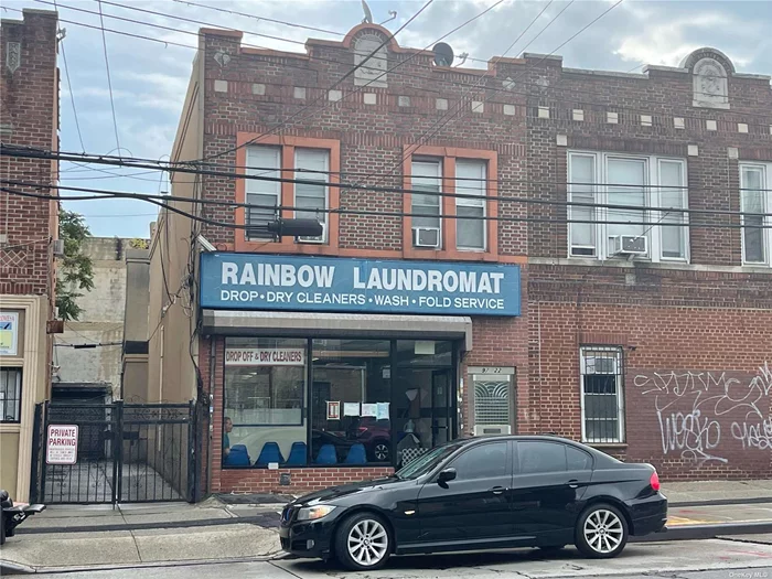 Well-maintained Solid Brick Building with 1 Commercial Stores & 2 Apartments(both 2Bedrooms) Store Has 9 Years Lease Remains, With 20x63 depth of the building at A OUTSTANDING LOCATION!!!!Very Low Tax!