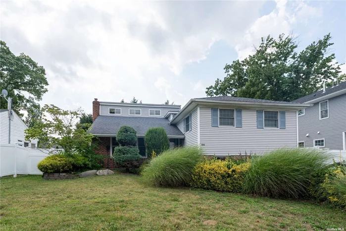 Welcome to this charming split-level home located in the desirable neighborhood of Syosset. This residence offers a comfortable and spacious living environment with its four bedrooms, two full bathrooms, and one half bathroom. With a lot size of approximately 6, 000 square feet and a living area spanning 2, 187 square feet, this property provides ample space for relaxation and entertaining. The main level features a well-appointed kitchen, equipped with modern appliances and ample cabinetry. Adjacent to the kitchen is the elegant dining area. The lower level of the home boasts a cozy family room, ideal for relaxation and entertainment. Additionally, this level features one of the two convenient full bathrooms, providing added convenience and functionality. Upstairs, you&rsquo;ll find the four generously sized bedrooms. The full bathroom on this level is tastefully designed and provides all the necessary amenities. The property&rsquo;s exterior features a well-maintained backyard. Located in the sought-after community of Syosset, this residence offers easy access to a wide range of amenities. Don&rsquo;t miss the opportunity to make this delightful split-level home your own, it wont last!