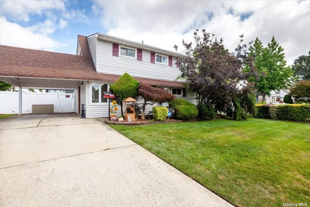 Welcome Home, To This Beautiful Updated 1/2 Dormered Cape Situated On A Quiet Block In Levittown. This Home Has A First Floor Bedroom, Laundry Room, Living Room, EIK, New Sliding Door And Rear Windows. Upstairs, Full Bath, And Two Additional Large Bedrooms, With Lots of Storage. The Three Year Old Solar Panels Are Leased. Lease And Electric Bill Total Only $100 Per Month!! Yard Is Fully Fenced. Near Schools, Shopping And Transportation. This One Will Not Last!