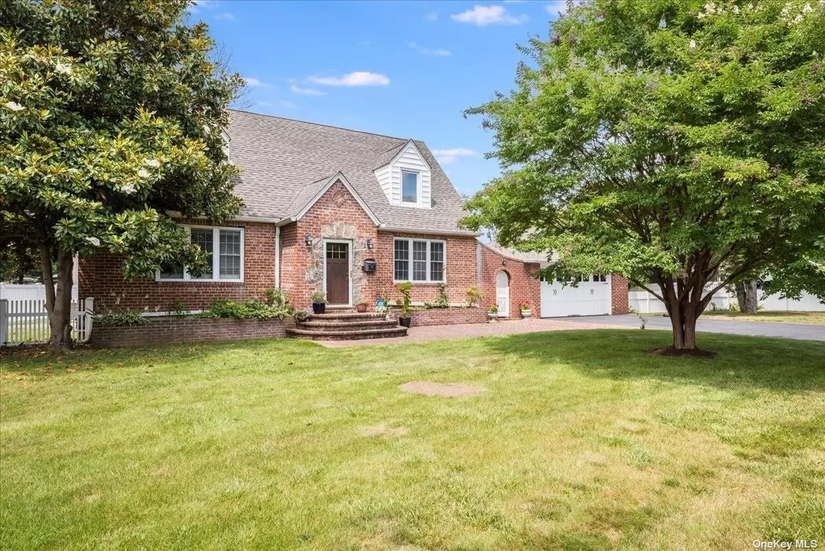 This lovely brick cape in Bay Shore boasts four bedrooms and two bathrooms. The kitchen has been recently renovated with Bosch appliances, quartz countertops, and a modern color scheme. Stay cozy during winter with a wood-burning fireplace in the living room. Each bedroom closet is custom-made, and the home features beautiful hardwood floors. The property was converted to gas eight years ago with a cast iron heating system and air handler. Benefit from the convenience of two-zone central air and two-zone heating systems. The patio has been updated recently, and the home is conveniently located near major highways, shopping centers, parks, and public transit. Don&rsquo;t miss out on the chance to see this amazing property!