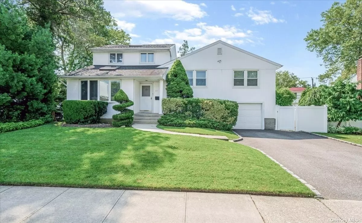 Welcome to this quiet, mid-block split-level home in south Syosset. Walk into this sun drenched living room/dining room combo that features a beautiful bay window, skylight and sliding door that leads to the backyard. 2nd floor gives you 3 bedrooms and 2 full bathrooms. Hardwood floors under all of the carpet on this level. The extension of the 3rd floor provides you a second primary bedroom with 2 oversized closets (1 perfect for turning into a full bathroom). The ground level features the family room which leads into the second backyard entrance onto the deck.