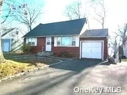 4br 2 bath cape wit basement and garage with large yard.House needs to be redone.