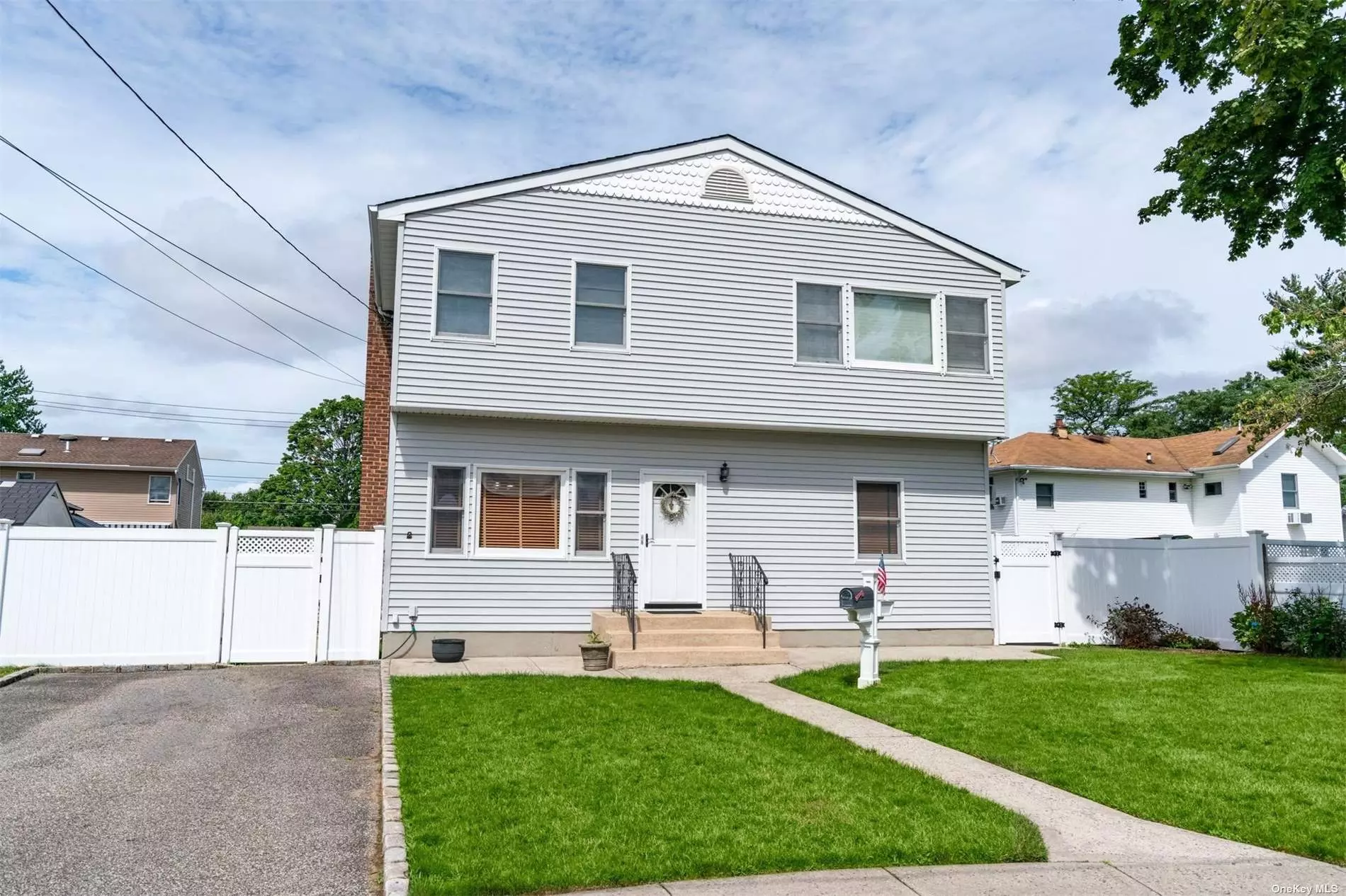 5 Bedroom Expanded Cape On Private Cul D Sac. Large Eat IN Kitchen, Fenced Yard, Basement With OSE.