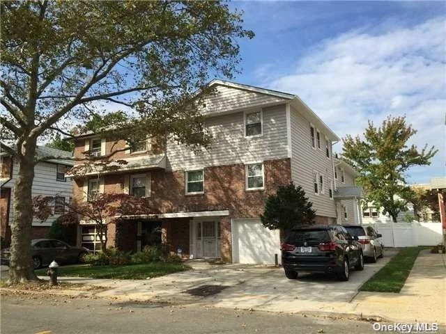 Spacious 3 Bedroom 2 Full Bath Duplex Apartment with a delightful southern exposure! Living space of approximately 1300 square feet. Hardwood floor, central air system. A washer and Dryer were installed in the apartment. School district #26: PS203, MS 158, and Cardozo High School. Few blocks from Queens Borough Community College. Close to shopping, banks, restaurants, and post office. Bus Q27/Q30/QM5/QM8. Easy access to major highways. No pets, no smoking, please.