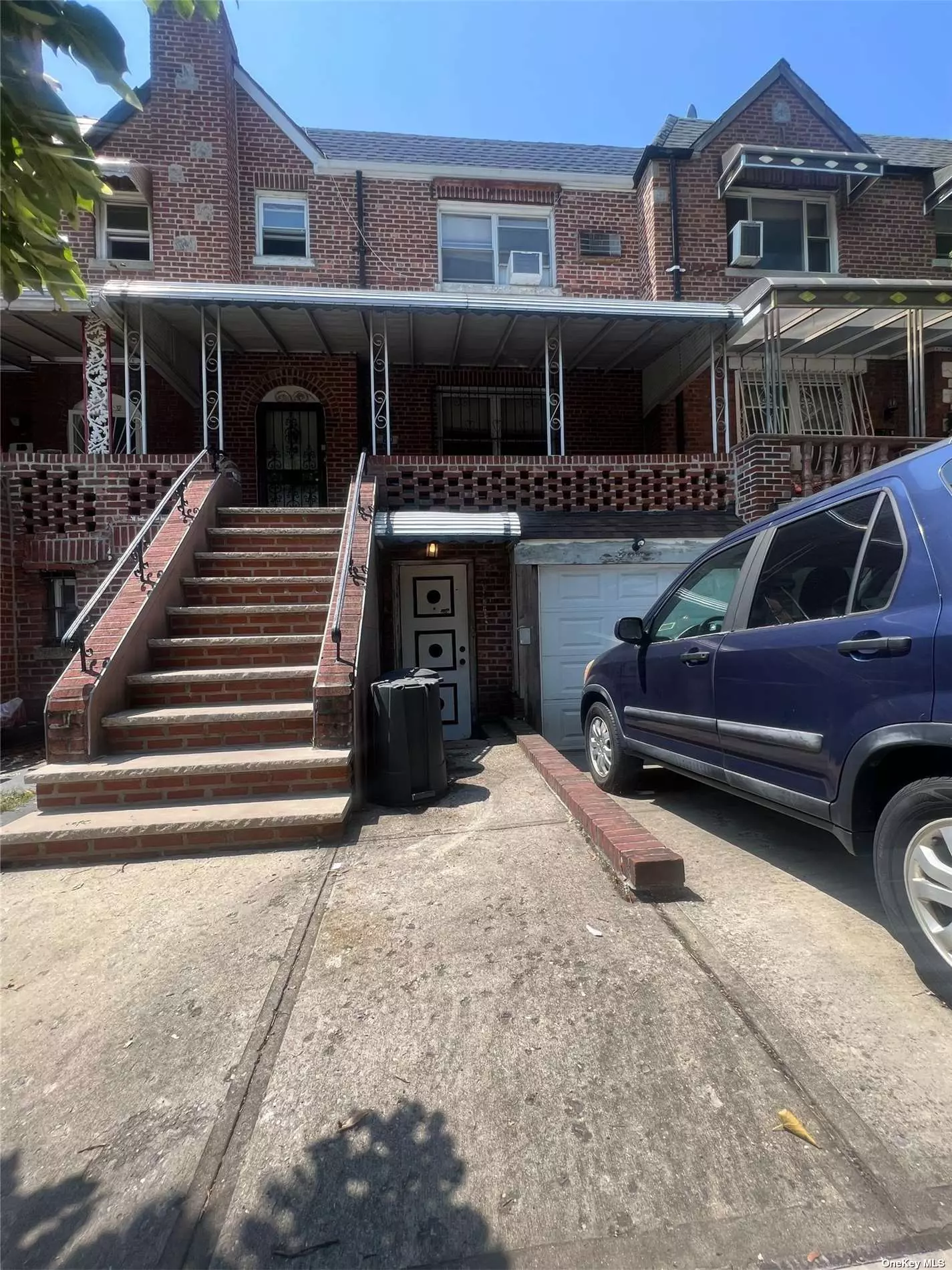 Welcome home to this 2 family brick house in the heart of East Flatbush. This home features 3 bedrooms, a spacious living room featuring beautiful gleaming hardwood floors, dining room, 2 kitchens, 2 bathrooms, full finished basement apartment with private entrance / walk-out and backyard space for entertaining; attached car garage.