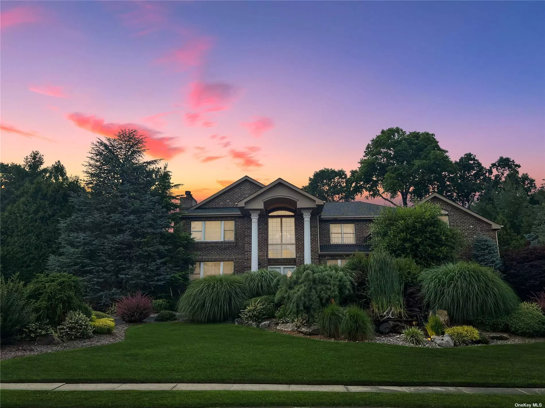 Welcome to the epitome of luxury living in Woodbury&rsquo;s Rolling Hills II, -part of the award winning Syosset Schools! This post-modern home is an architectural masterpiece with a two-story entryway, providing a grand and welcoming impression to all who enter. The open floorplan creates an expansive and airy atmosphere, accentuating the beautiful hardwood floors that flow throughout the house. The living room, adorned with a captivating fireplace, offers a cozy space to gather. The entire house has been thoughtfully renovated, leaving no detail untouched. Beautiful moldings and large windows hilight some of the best features of the home. The gourmet eat-in kitchen, boasting high-end appliances-(VIKING, Jenn Air), sets the stage for culinary delights and memorable gatherings. Indulge in the opulence of the luxurious master bathroom, featuring a claw foot tub and a glass shower, offering the perfect sanctuary for relaxation. With four additional bedrooms and a bonus room, there is ample space to accommodate every aspect of your dream lifestyle. For comfort and convenience, the house is equipped with gas heating and cooling systems, ensuring a cozy atmosphere all year round. The lower level of the house is an entertainment haven, featuring a huge play area, game room, gym, and direct access to the enchanting backyard. Step outside to discover an outdoor oasis that rivals the most exclusive resorts. The backyard boasts an exquisite inground heated SALT WATER pool surrounded by meticulously landscaped gardens and lush plantings, providing a tranquil escape for you and your guests. Whether you love outdoor cooking or entertaining, the outdoor kitchen is designed to cater to your desires. The backyard also includes a trampoline for those who seek playful fun and an abundance of grassy areas, perfect for unwinding and soaking in the natural beauty that surrounds this remarkable property. This luxury listing in Rolling Hills truly offers a lifestyle of grandeur and sophistication, a perfect blend of modern amenities and natural splendor. Don&rsquo;t miss the chance to make this extraordinary home your own and experience the pinnacle of refined living