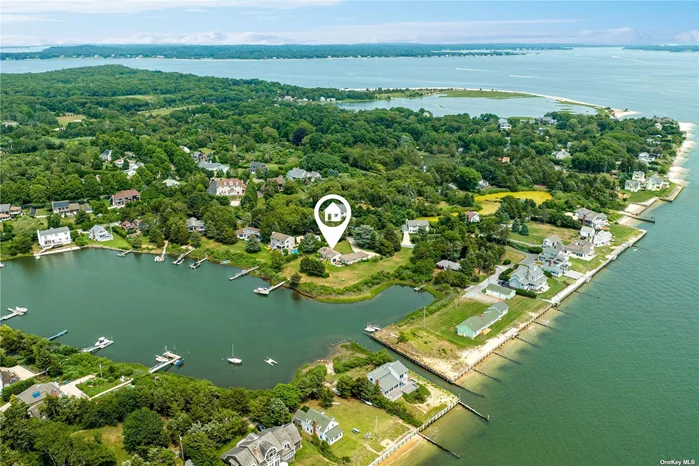 Discover a rare gem - a waterfront property nestled in an exclusive neighborhood, waiting for you to seize this extraordinary opportunity. This idyllic retreat boasts its own dock, mere moments away from the serene bay, as well as private beach access for West Lake Homeowners, offering an unparalleled and exclusive experience. Prepare to be captivated, inside and out, by breathtaking vistas that showcase the untouched beauty of the North Fork. With nature&rsquo;s wonders as your backdrop, this residence harmoniously blends tranquility and luxury. Step inside to find a thoughtfully designed house with 4 bedrooms and 2 full baths thoughtfully arranged in separate wings for utmost privacy. A seamless open concept living area draws you in, inviting you to bask in the splendor of the surrounding water features. And if that weren&rsquo;t enough, there&rsquo;s ample space to create your oasis - a pool, a dreamy expansion, the possibilities are endless. But the enchantment doesn&rsquo;t end at your doorstep. Discover the allure of Cedar Beach State Park, located literally around the corner, beckoning you to explore its natural wonders. Unpack your bags, and without delay, immerse yourself in all that the North Fork has to offer. Don&rsquo;t let this once-in-a-lifetime opportunity slip away. Embrace the lifestyle you&rsquo;ve always envisioned - a waterfront haven surrounded by beauty and serenity. Secure your slice of paradise today and make cherished memories for years to come.