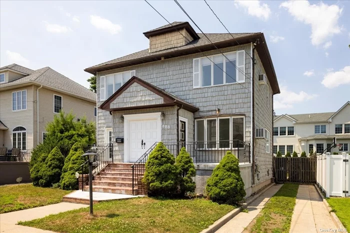 A Center Hall Colonial in a prime Location in Woodmere. There are 4 Bedrooms on one Second Floor.Eik, 2 zone Gas Heating, Finished Basement, 2 zone Gas Heating, Fenced big yard, Privacy, Close to many homes of worship, shopping , and Lirr, Quiet block plus low taxes!