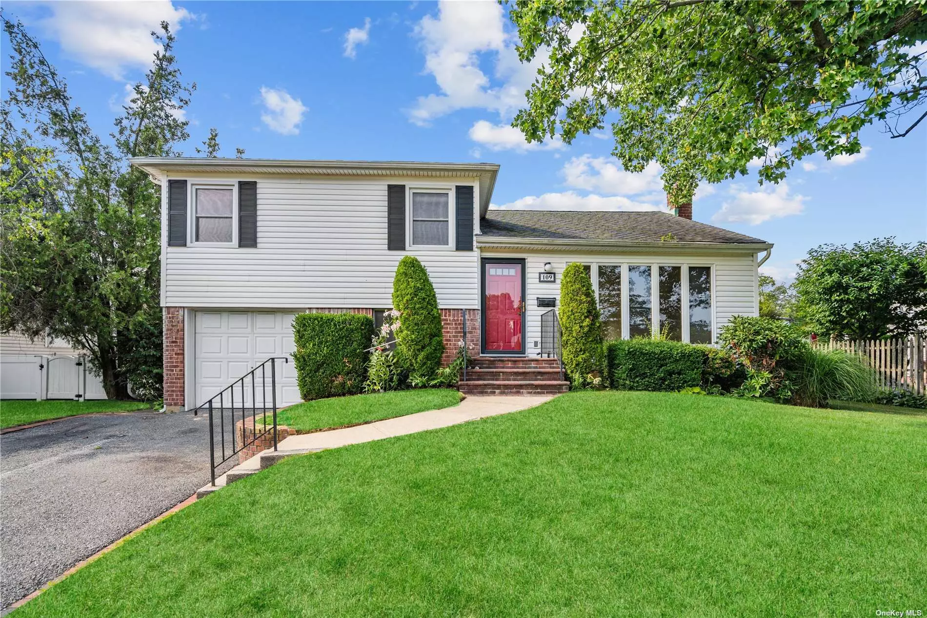 Split-level ranch located in the heart of Syosset. This cozy home is complete with 4 bedrooms, 2 full baths, laundry room, and dining area off of the kitchen. The backyard features an elevated deck off the dining area, with a concrete patio and large, cleared grass area. Other amenities include one car garage, driveway, and well-kept front yard, and shed in the backyard is a gift. Being sold as-is.