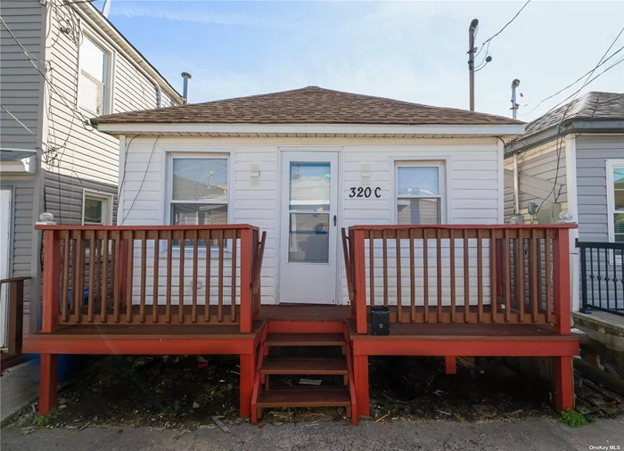 Beach Lovers Dream!! Private Two Bedroom Bungalow, Vaulted Living Room, Kitchen-gas stove, Dining Area, Fully Renovated Bathroom. Attic for Storage, front porch. Two blocks from beach and close to public transportation, schools, park and shopping. Great investment property.