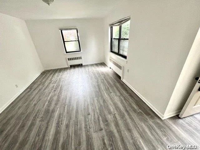 New Vinyl Plank Floor , New bathroom Vanity!!! SE Corner Lower 2 bedrooms COOP garden apartment in School District #26, PS205/MS74/Cardozo High School, super easy on commute -Bus Q27 to Flushing , Q88 to Queens Center/Elmhurst , Express bus QM5/8/35 To NYC downtown & Midtown. Near Alley Pond Park/Convenient To All/Shopping Center, , Washer & Dryer Allows Installed In Unit by buyers . Dog Friendly, No Flip Tax, Sublet Allows After 2 Yeas Owner Occupied on 2 years term with board approval . coop request 20% Down-payment Must 30% Debts to income ratio . assessment $57.20/monthly till end of 2028 , security patrol car 5pm-8am $18.70/ monthly . maintenance $961/ monthly includes unassigned 2 FREE PARKING STICKERS and cooking gas , property tax, water, heat, ground care & snow removal . self pay electric only . individual entrance more privacy .BBQ area on your right side of front yard & side yard ., Additional information: Interior Features:Efficiency Kitchen