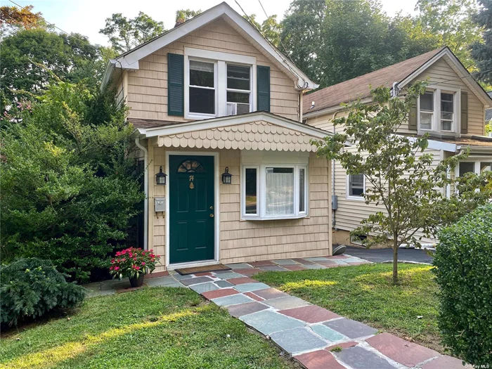 Charming 2 Bedroom home in the heart of Locust Valley. Large kitchen with room for a 6 person dining table. Updated bathroom. Laundry in basement with plenty of storage. In-ground sprinklers. Great deep backyard with a sunny and private southfacing deck. Walking distance to town, train and shops. Desirable block.