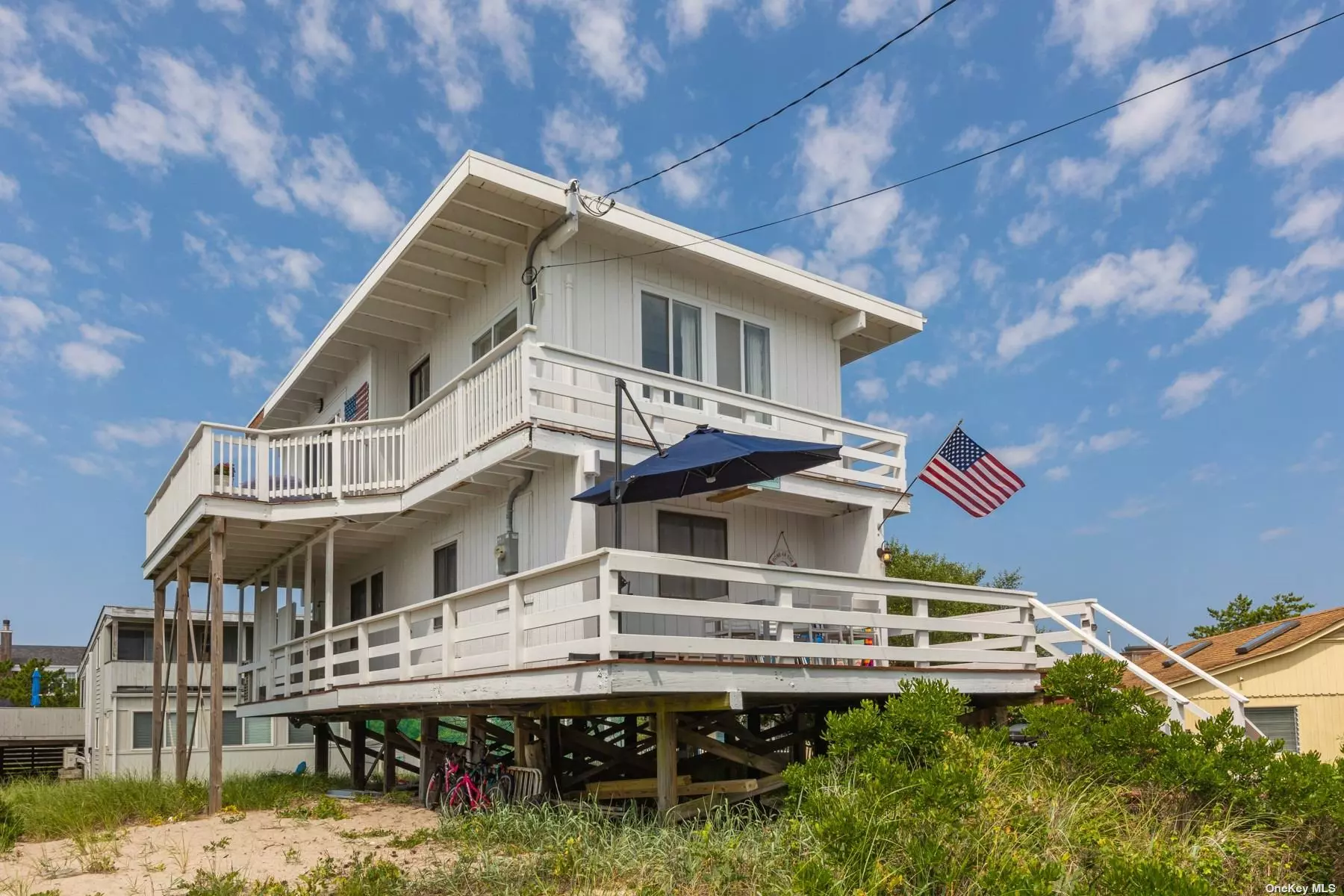 Reserve Your Kismet Fire Island Summer Vacation Now.!!! Super Convenient With Spectacular Views . This 3 from The Ocean 4 Br, 2 full bath Beach House comes fully Equipped ,  w/ full ac, outdoor shower, washer/dryer. Open Concept Living Room/Kitchen, W/ Sliders to Upper level Deck , Sleeps 10 Comfortably , #1 Primary w/ King Bed, # 2 Bedroom w/ 2 twin beds & 1 full bed, #3 Bedroom w/ 3 twin beds, #4 Bedroom w/ 1 twin bed & 1 full bed. This house also features: propane bbq, 5 bikes w/ locks, 1 wagon w/ lock, ocean paddle/surf board, 1 surf cast pole, 4 kids bay fishing rods, 10 beach chairs, 2 mini beach lacrosse cages, 2 boogie boards, 1 skim board, sand toys & shovels. Available Dates Now.!! May,  June 1-14 , Aug 1-13 , Sept 4-30,  Oct.
