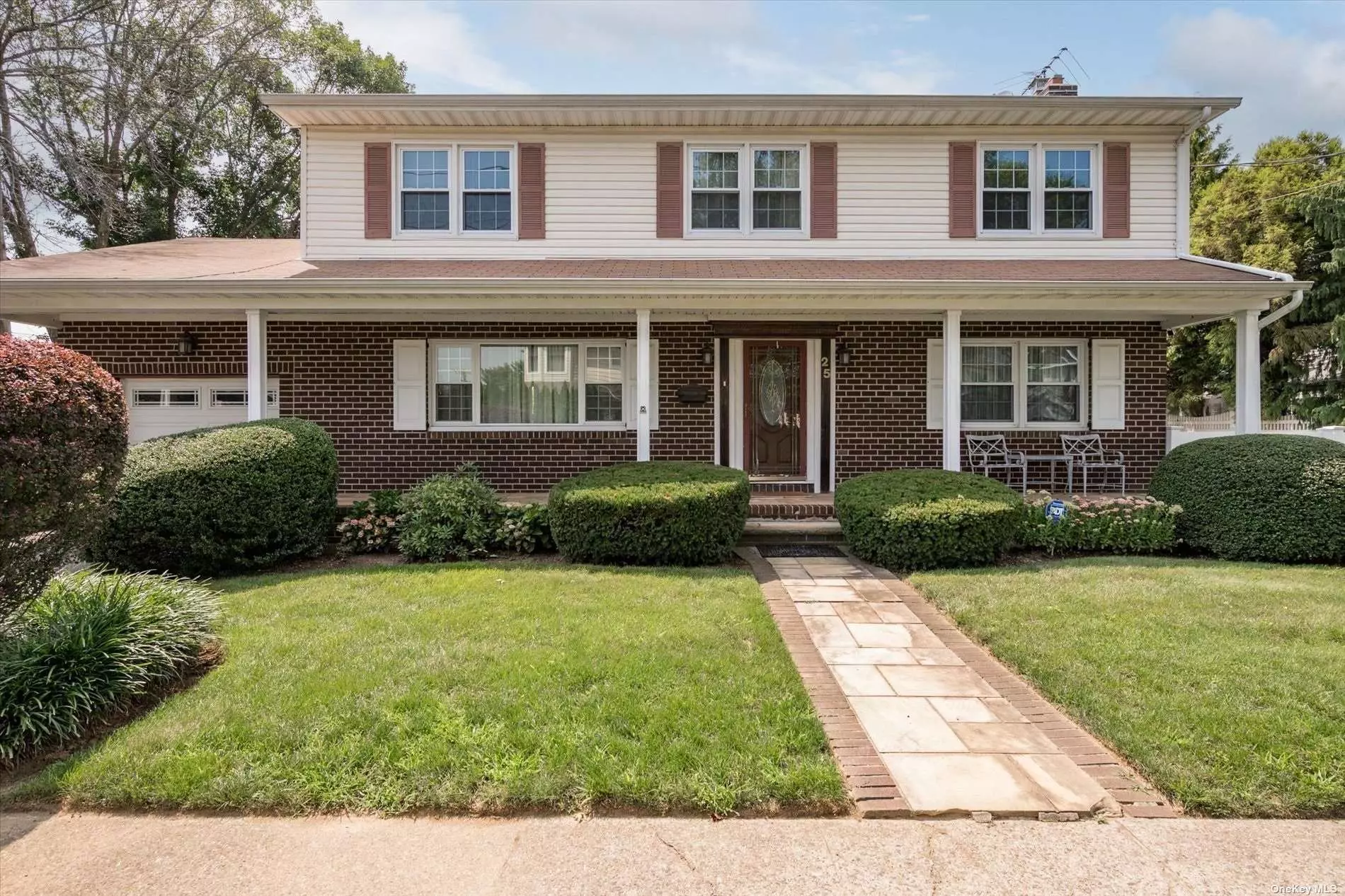 Beautiful four bedroom home with hardwood floors throughout. Desirable center hall colonial floor plan. Corner property with a side yard which provides ample privacy. Updated appliances.