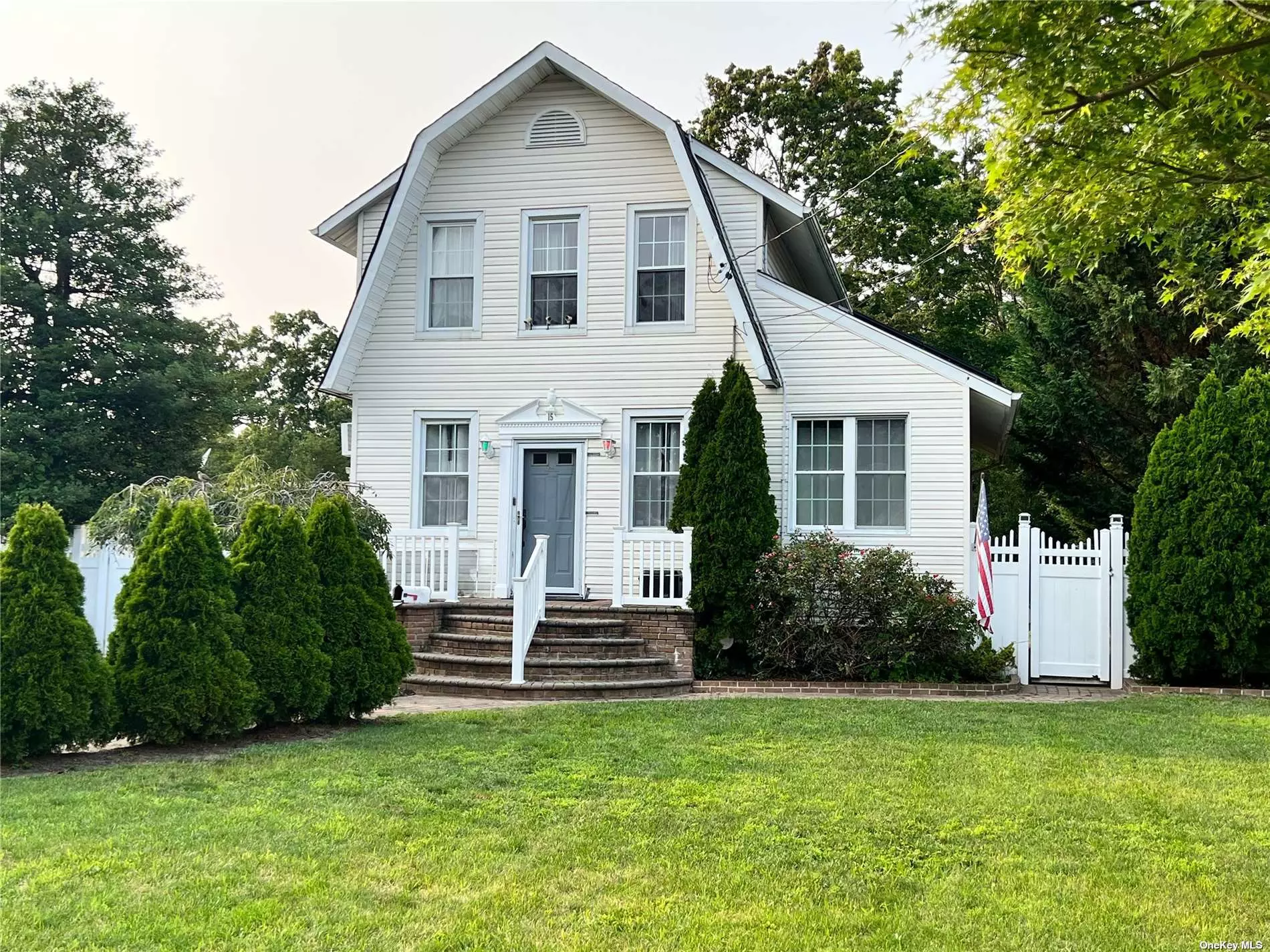 OPEN HOUSE CANCELED If you are looking for curb appeal, this home is for you!!!  This lovely Dutch Colonial in the heart of Babylon has charm!  This home offers updated kitchen, bathrooms, whirlpool tub, wood flooring, updated boiler, central air conditioning on second level, wall air conditioner on first level, siding and windows, in addition to high ceilings and loads of charm. Lovely park-like property with block patio and fully fenced backyard! Please note the solar panels are leased and new owner to take over lease. Close to town and more! Make this your home today! Please note that the plastic shed, outdoor ornaments, mailbox with name and tv&rsquo;s are excluded from this sale.