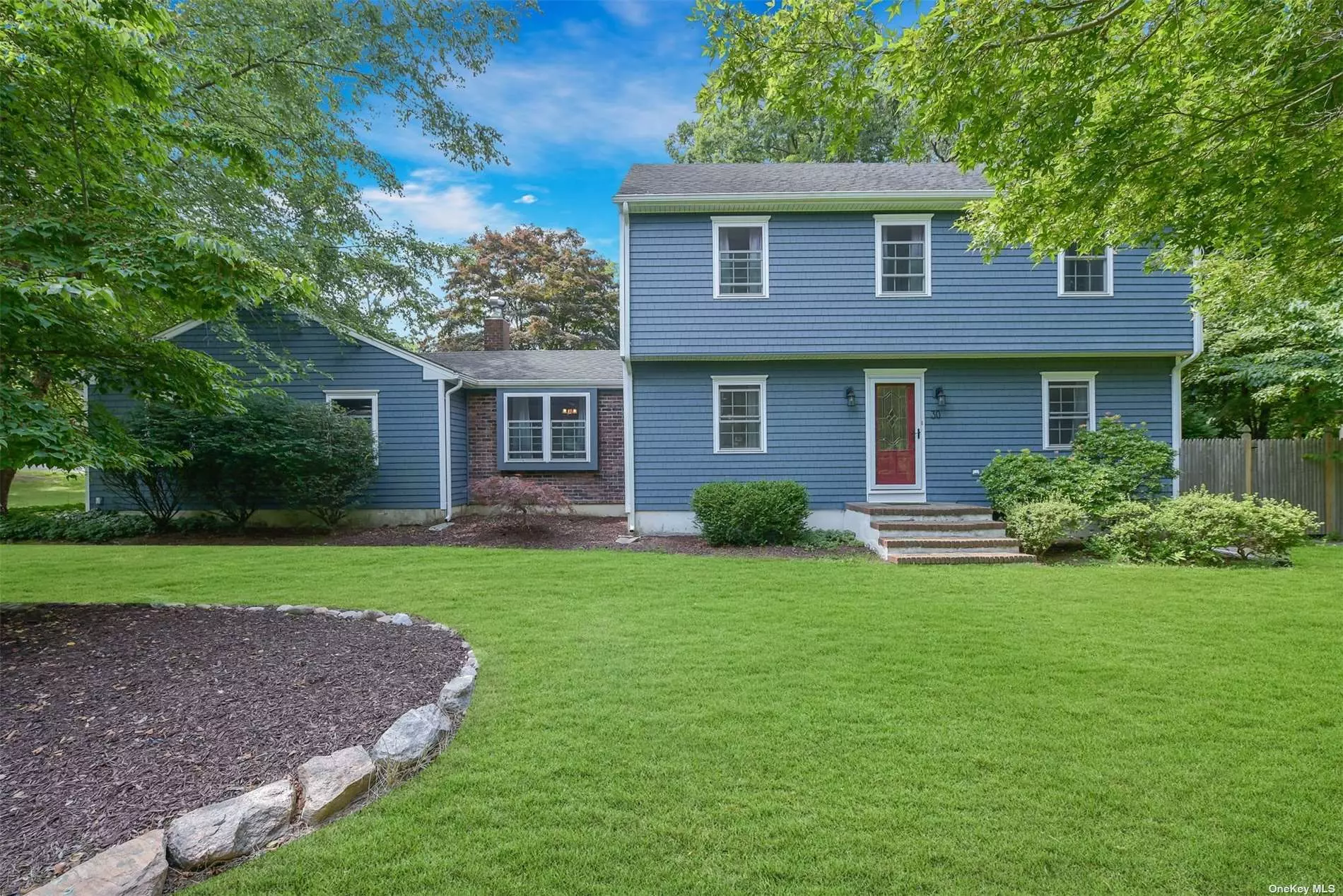 Location, Location! Welcome Home to This Fabulous Sun Filled Colonial with an Open Floor Plan! Updated White Eat-in Kitchen with Granite Counters, Subway Tile Backsplash, Stainless Steel Appliances, & Butcher Block Island, Hardwood Floors Throughout, Hi Hats, Ceiling Fans, Custom Paint & Moldings, French Doors & Sliders, 2 Brick Faced Woodburning Fireplaces with Custom Mantles, Updated State of the Art Baths with Subway Tile, Finished Walk-up Attic, Full Basement Just Waiting to Be Finished, 200 Amp Electric, Brand New Heating System, Brand New Cedar Illusions Vinyl, New Gutters, Young Roof, New 2018 Septic System, 2.5 Car Garage, Beautiful Treed .41/Acre Corner Property with Deck, Brick Patio, Hot Tub, Large Driveway with Plenty of Parking & More! Famed Shoreham-Wading River School District!