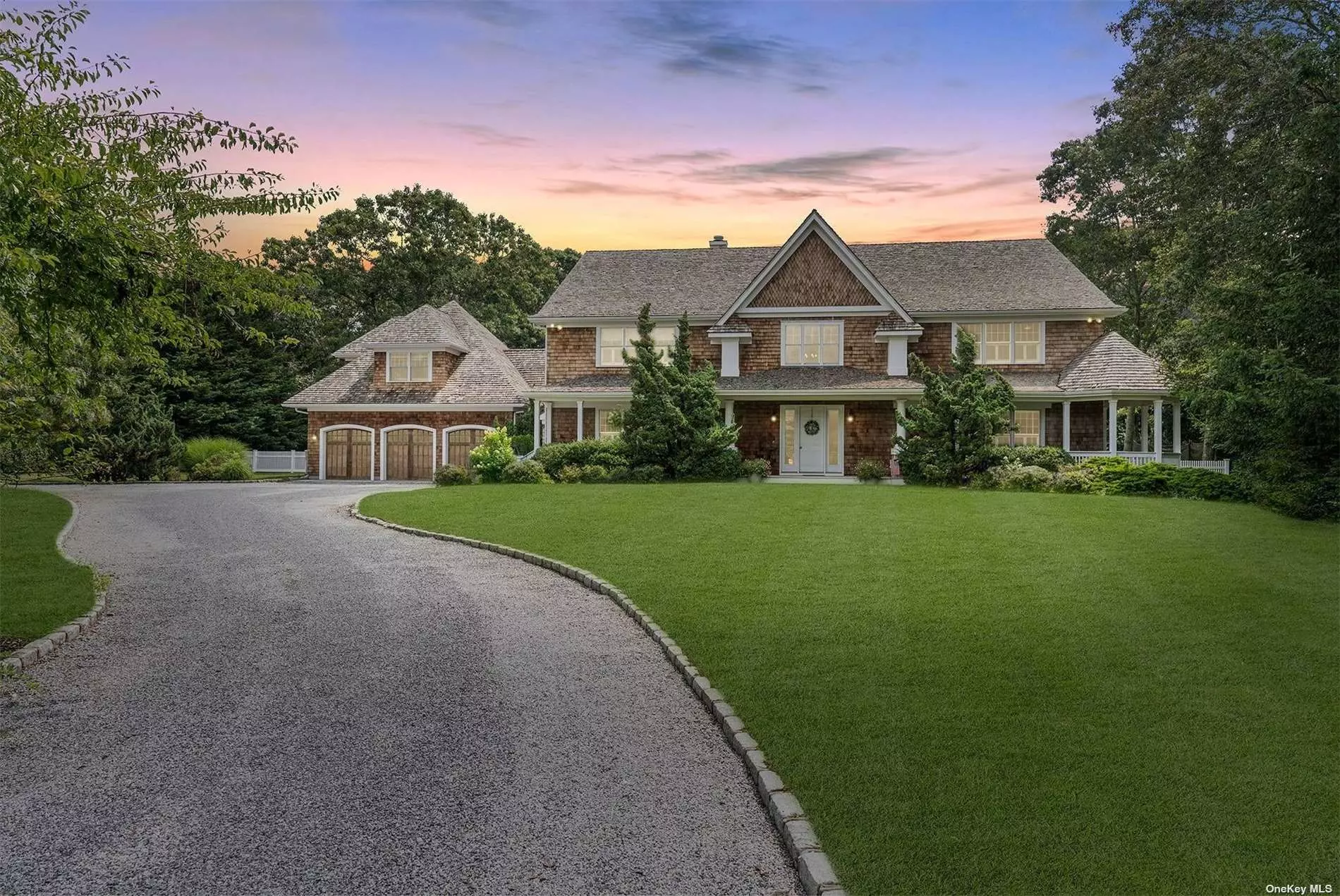 Located in the heart of Quogue South, this stunning generational estate sits on 1.7+/- acres in a cul-de-sac, off a private road. With over 7, 600+/- sf of elegantly appointed living space, the 30+/- ft tall entry provides a hint of the meticulous custom millwork throughout. The first floor features a living room with a fireplace and French doors which open to a spacious yard with a heated gunite pool, a classic brick patio, and ample room for tennis or pickleball. The main kitchen showcases an oversized granite center island, high-end appliances, and a dining-sized breakfast area in addition to a large, fully equipped catering kitchen. The grand scale of the first floor is complete with a second primary ensuite, a family room with a private covered lounge area, a half-bath that opens to the pool, a formal dining room with a fireplace, and a powder room. The massive second-floor primary suite has a private balcony, double walk-in closets, and a fireplace. The ensuite bath is framed with marble and features two vanity areas, a double steam shower, and a Jacuzzi. Three additional guest rooms, including one ensuite and two with a bath, plus a terrace and a laundry room complement the upstairs. Additional amenities include an entertainment room with a 16&rsquo; vaulted ceiling and a three-car garage.