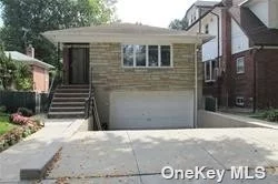 Beautiful Sun Filled Large 3 Bedroom, 2 Full Bathrooms, Eat In Kitchen, Formal Dining Room, large Living Room With Gleaming Hardwood Floors, Private Separate Office, Central Air Conditioning, Private Entrance, Parking In Driveway, Use Of Side Yard & Patio, Mid Block Location On A Quiet Tree Lined Street. Close To LIRR, Q16 & Q28 Bus Lines