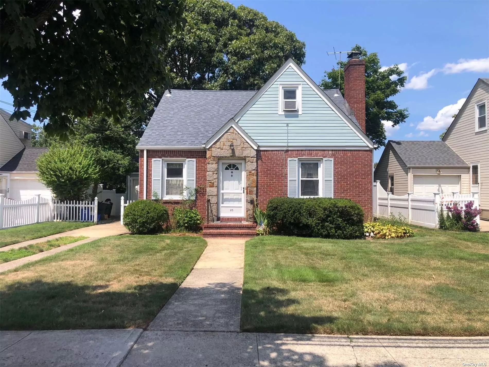 New to the market! Charming 3 bedroom 2 full bath Cape Cod style home. Do not just eyeball from the street; it is much bigger than it looks. The main floor of this home boasts all hardwood floors (under the rugs, ) living room with fireplace, very large dining room, full eat-in-kitchen, and main floor Primary bedroom. The two second floor bedrooms have built ins and plenty of storage. Features also include a full partially finished basement with a full bath, as well as an attached 1 car garage, rear deck, and a yard that backs up to a lovely park. Updates include roof, bath, windows and hot water heater. This is a special home that is just waiting for you to make memories within its walls.