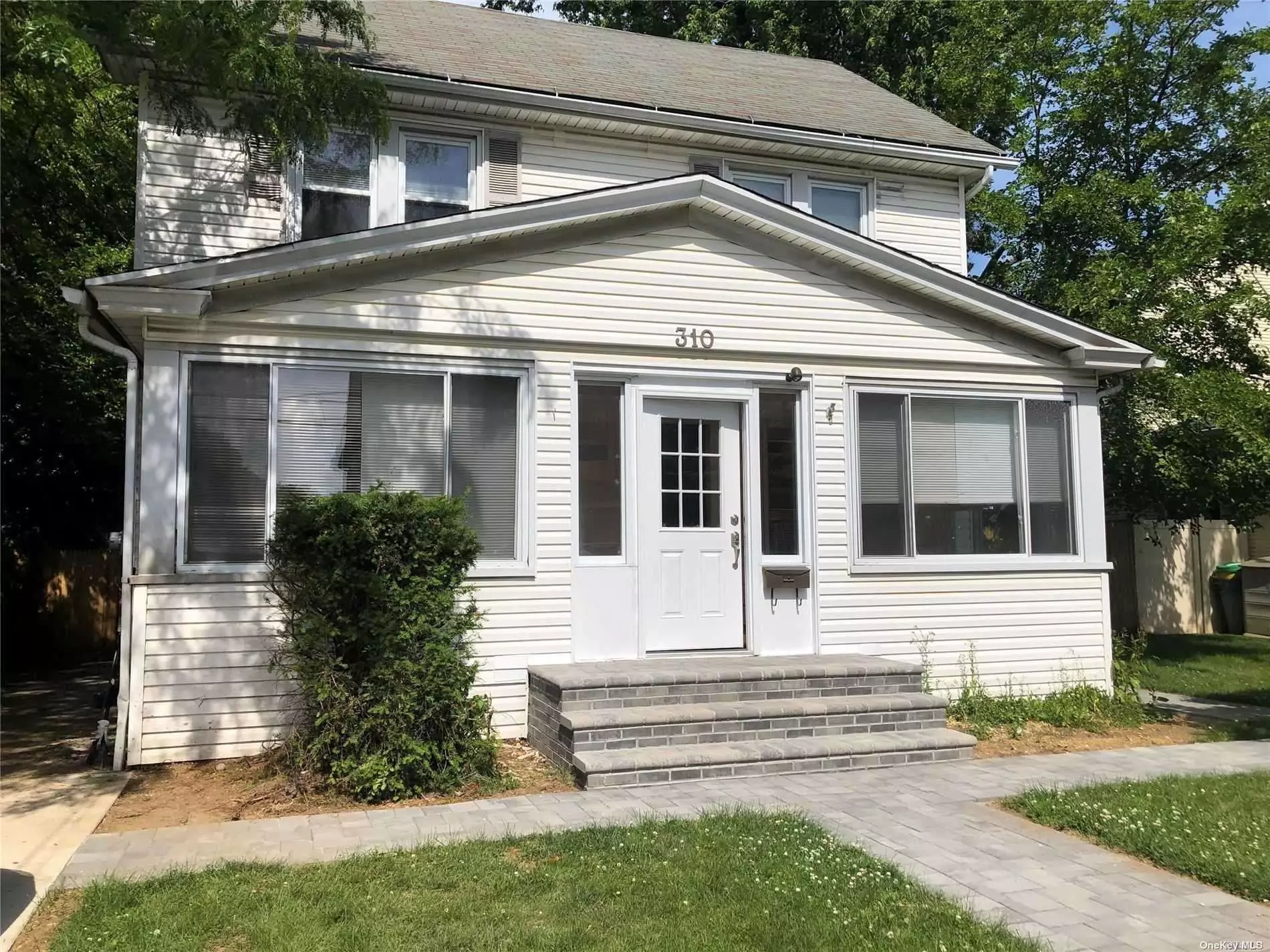 Step into this freshly painted 4 bedroom, 2.5 bathroom colonial in the heart of Cedarhurst with a finished basement on a quiet block with quick access to shopping, train and all else. Available ASAP.
