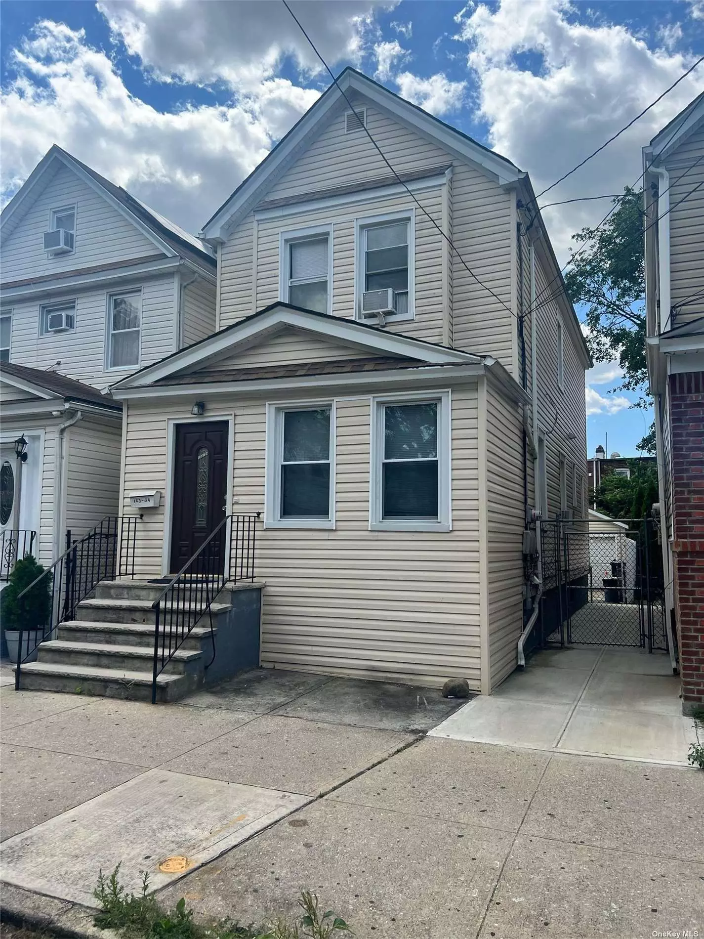 2 Family in mint condition just footsteps away from the A train. This property features 4 bedrooms, 3 full baths, 2 kitchens and a full finished basement with outside entrance. Close to all amenities.