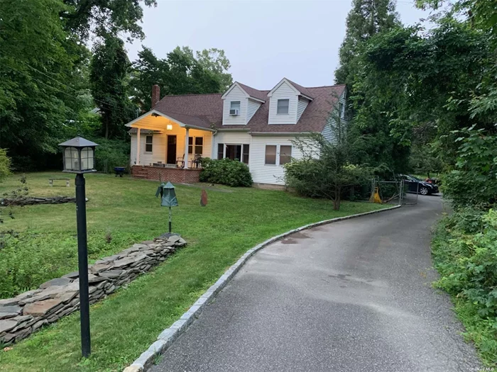 Beautiful large private property. Furnished or not. Home sits back 265 feet from the road. Parking for four or five cars in the back. 400 feet deep 175 feet wide.