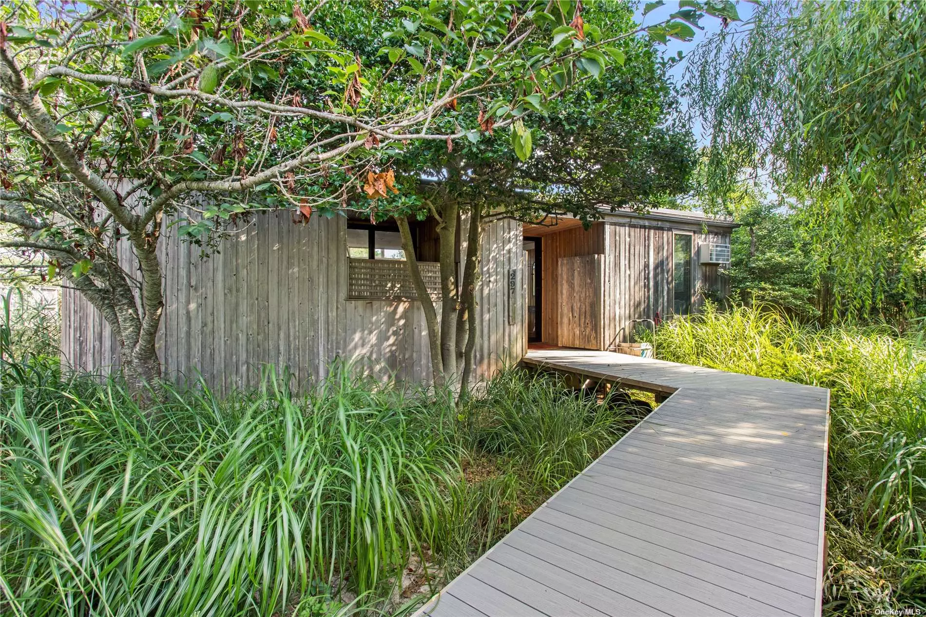 Beautifully renovated midcentury. 4 large bedrooms. Sun filled open living, dining kitchen. Extra large, all day sun pool deck with hot tub. Extraordinary rent roll.