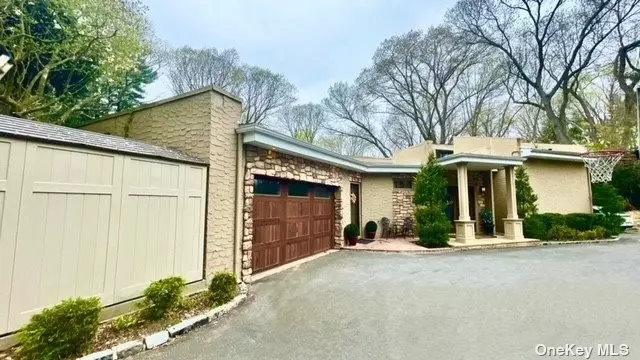 Tranquility, elegance and privacy is how you describe this spectacular One-of-a-Kind 5000sq.ft. 6BR, 4.5 Bath contemporary home located in the Inc. Village of Muttontown. Over 2 lush acres of landscaped property with gas heated 20X40 inground salt water pool. Beautiful entry leads you to a stunning large living room with stone fireplace and over sized formal dining room with direct acces to the porch. Gourmet kitchen with Viking fridge and wall stove. Fisher & Paykel professional stove, unique breakfast area and cozy separate bar area. Cathedral ceilings. Main floor boasts a huge primary bedroom with gorgeous primary bath, additional 3 oversized family bedrooms, 2.5 Bathrooms, laundry/office room, outside entrance to a 2 car garage. Lower level is all about having fun with huge finished family entertaining room. Great for home office and ideal for extended family stay or full complete guest quarters. 2 large bedrooms with 2 full bathrooms, laundry room, outside entrance overlooking pool, gated dog run, oversized bi-level new patio and deck also includes generator, new hot water heater, new doors, skylights, sprinklers, 2 sheds, one septic tank and 2 cesspools. Low taxes, close to highways, stores, nearby golf/tennis clubs, nature preserves and only 25 min. from NYC. Don&rsquo;t miss out on this gem of a dream come true house!