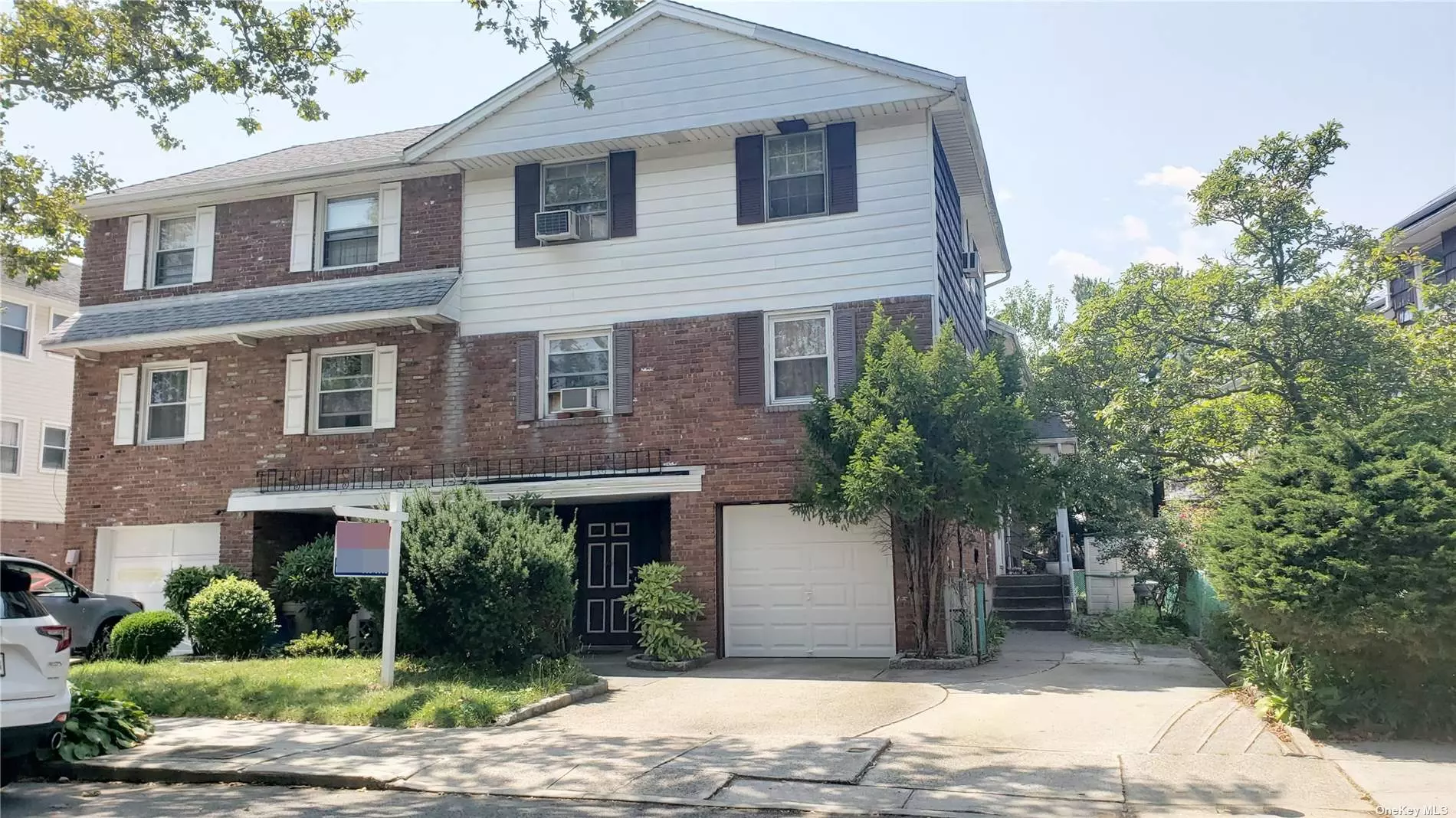 2 Family Split Level in the heart of Oakland Gardens, 1st floor is Triplex($3125/m), 2nd is Duplex with side entrance($2250), 1 Car garage with 2 driveways, Walk to PS 203 and Cardozo HS and Queens Community College, Close to Oakland Lake and shops and bus stop to Flushing and Express to City