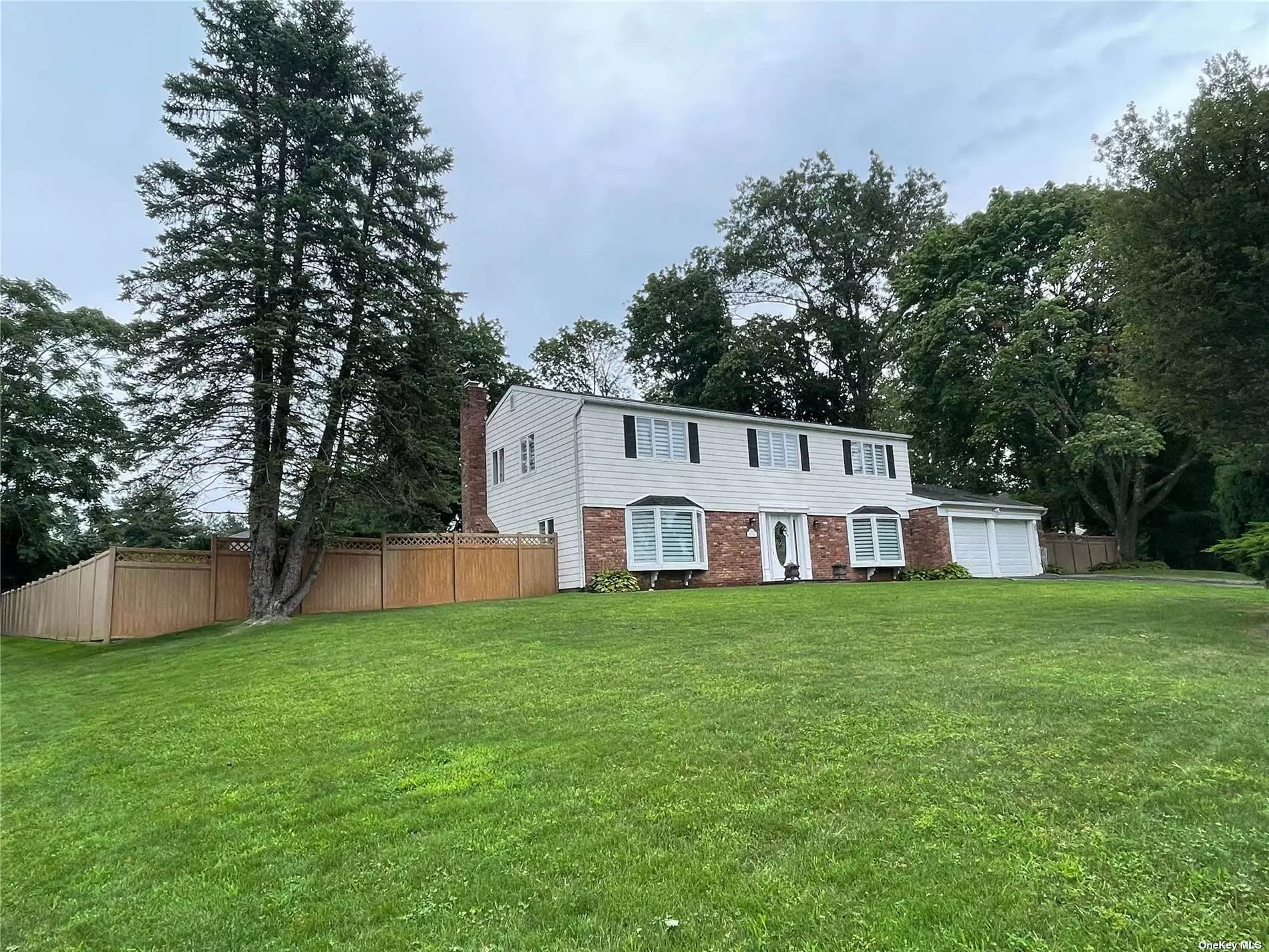 This perfect and spacious center hall colonial is magnificently done with decorator touches throughout. Stately gracious and ready for a lifetime of memories created throughout and spilling into the serene park-like setting of the backyard with inground pool.