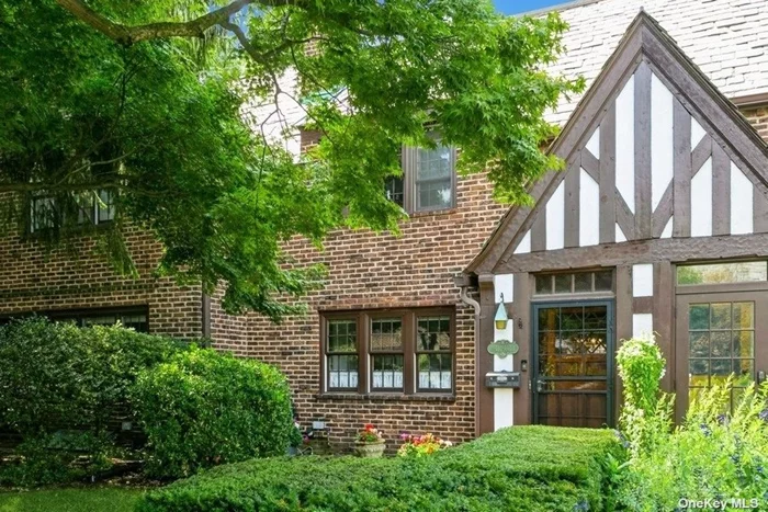 Rarely available Arbor Close community of Forest Hills this tudor townhouse exudes lots of charm. This townhouse is reminiscent of the English Gardens communities. Upon entering the vestibule, you are in a cozy Living room with a wood burning fireplace. A formal Dining room, leads to a large galley kitchen with door to a private back patio. The second floor features three bedrooms and a full hall bath. The finished basement has a full bath and separate laundry area and another Finished room. Spectacular Private Park only accessible to residents. Garage, HOA $450/year. Garage dues $400/year.