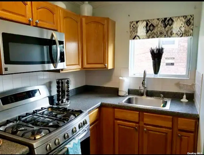 Welcome to this Fully Furnished, Clean, Updated 2nd floor 1 Br /1 Bth Beachside Apartment just a few minutes to the Beach! Newly renovated throughout, CAC, SS appliances, LR, Dining room, Open Kitchen and bath, Bright and airy! 10 min to JFK Airport, close to Rockaway Beach, Free shuttle to the ferry that takes you to Manhattan. No w/d but laundry mat is across the street. Close to shops. 1 Block away to the A train. Nothing to do but just move in! Tenant pays heat/gas and electric and cable.