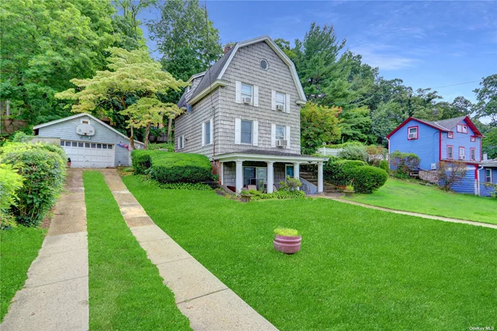 Spacious Dutch Colonial home located on Shore Road, between Glen Cove and Sea Cliff. Beautiful oversized lot with detached 2 car garage. 3 bedrooms and 1 1/2 baths, with lower level Den/TV room. Large rear deck and front patio. Gas boiler. Low low taxes.