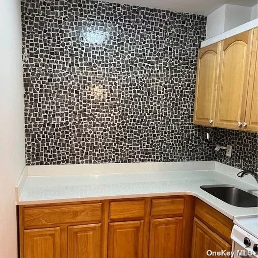 Newly Renovated 2 Bedrooms Apartment on the 1st floor. Large Living Room, Updated Kitchen and Bath. Heating is Included, Close to Everything. Excellent School (Ps46, JHS74 and Cardozo High School), A Must See