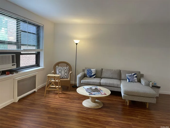 Spacious 1 Bedroom in beautiful Windsor Park! This corner unit is the largest one bedroom layout. There is a full-size living room, separate dining area, full kitchen and large bedroom. The apartment is in excellent condition and has lovely hardwood floors and numerous closets for lots of storage space. Windsor Park boasts an in-ground pool, a private gym, playground, basketball court, tennis courts and security booth. Located near Bell Blvd, enjoy the easy shopping, transportation and the fantastic schools in District 26.