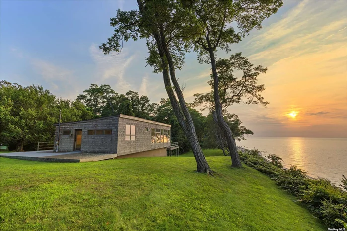 Peconic Soundfront Meets Mid-Century Modern- Incredible Sunsets And Your Own Private Beach Are Yours In This Sun-Drenched 3 Bed, 1Bath Beach Home Awaiting Your Magic Touch. Full Basement, 1 Car Attached Garage.