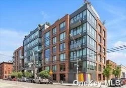 Spectacular 1 BR / 1 BA condo includes own garage parking in the heart of Greenpoint, Brooklyn, pet friendly! one block from the East River and a 5-minute walk to the India St Ferry stop (daily service to midtown / downtown) and also minutes from the Greenpoint Ave Station - G train. This listing also included heated garage parking space on-site. Built in 2017, this bright and sunny unit has tasteful high end and modern finishes, gourmet kitchen appliances, marble countertops, custom cabinets and a utility/laundry closet with an in-unit Bosch Washer/Dryer. One large bedroom and one luxurious bathroom. Stunning beautiful hardwood floors, large windows with full length solar shades including a large walk-in closet in the bedroom. Amenities are including a doorman / concierge (not virtual), a landscaped roof top with dining and stunning 360-degree east river views, fitness center, bike room, kids&rsquo; play room, package room, and social lounge with fireplace.